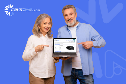 carsdna.com | Two people holding a laptop displaying a car history revs report PPSR website against a blue background with 'carsDNA.com' branding.